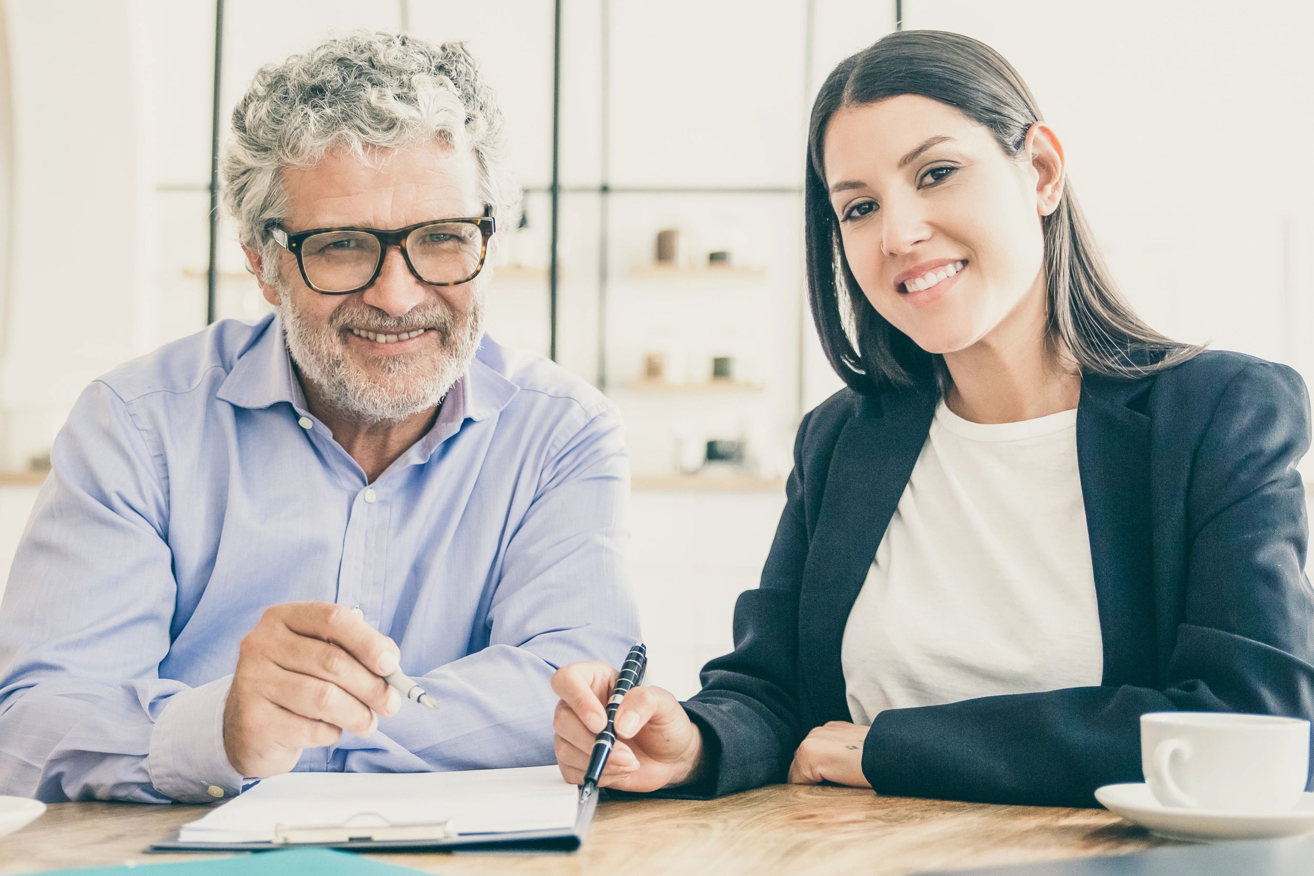 Professional consultation at a table with documents