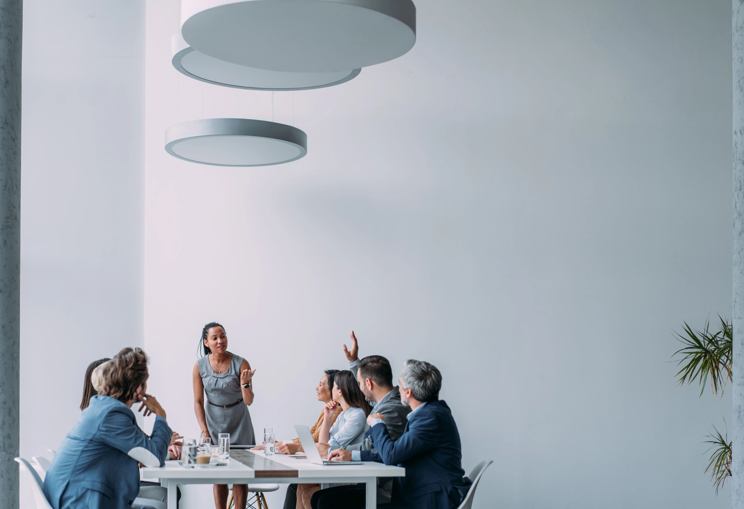 Professional presenting to a business team