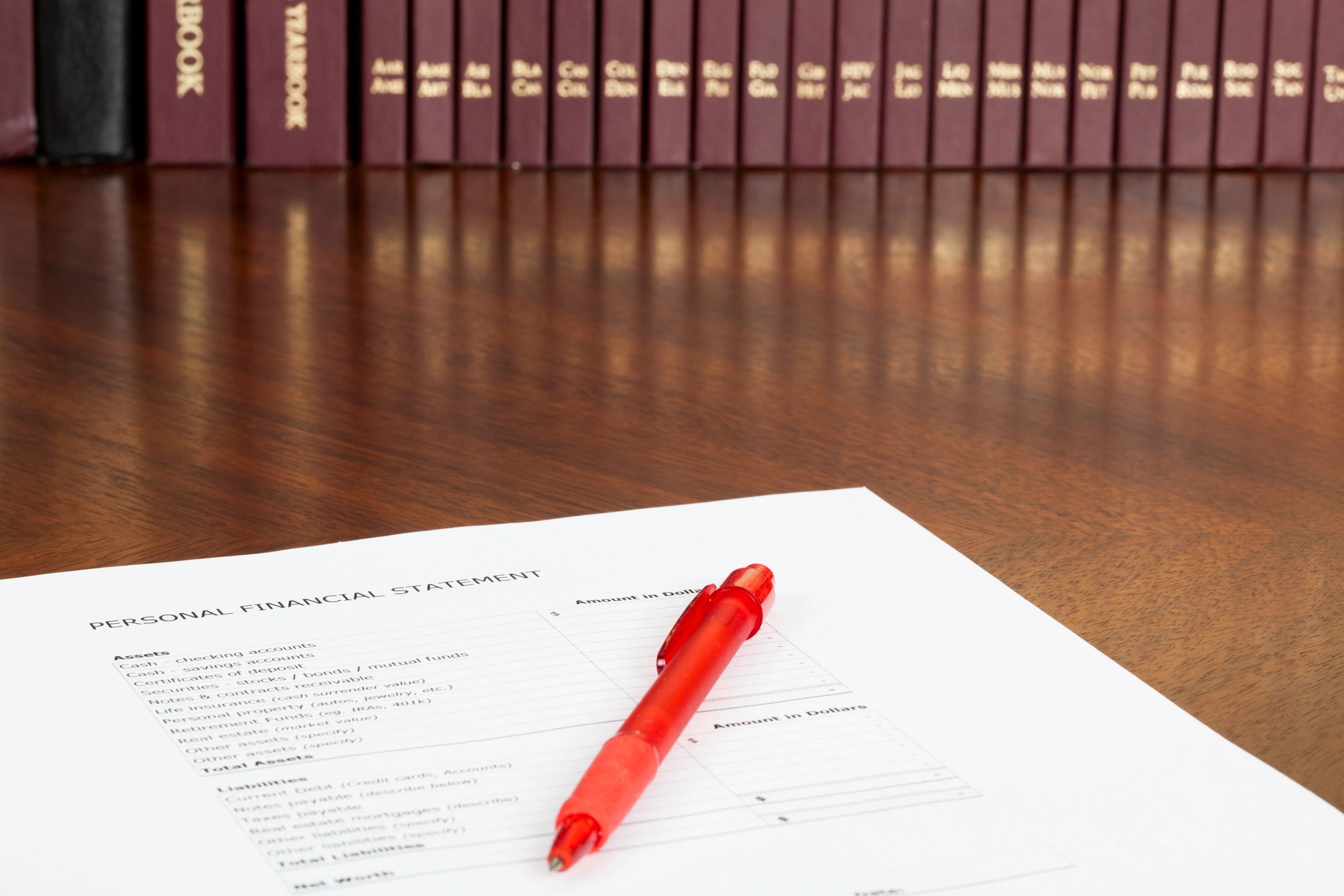 Financial statement on a lawyer desk